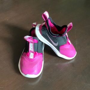 Toddler girl size 6c Nikes. Used, good condition. Fuchsia and black.